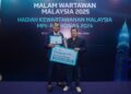 MOHAMAD Rizal Mohamed Nor (kanan) dan 
Mohamad Sany Misnan dipilih pemenang Malam Wartawan Malaysia 2025.