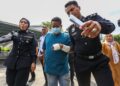 PEMANDU bas terlibat nahas pelajar UPSI Isnin lalu dibawa ke  Mahkamah Gerik hari ini. - UTUSAN/MUHAMAD NAZREEN SYAH MUSTHAFA