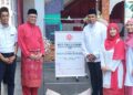 SHAMSUL Anuar Nasarah (tiga dari kiri) dan Mohd. Zaidi Mohd. Said (tiga dari kanan) ketika perasmian Mesyuarat Perwakilan Wanita, Pemuda dan Puteri UMNO Permatang Pauh di Pulau Pinang, hari ini