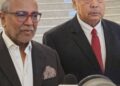 PEGUAM Muhammad Shafee Abdullah dan Mohamad Salleh Ismail selepas prosiding taksiran ganti rugi dalam kes saman terhadap Public Bank Berhad di Mahkamah Persekutuan, Putrajaya di sini, hari ini.