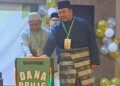TUAN Ibrahim Tuan Man melancarkan tabung Dana PRU-16 pada perasmian Mesyuarat Agung Tahunan Pas Kawasan Parit di Seri Iskandar di Parit hari ini.