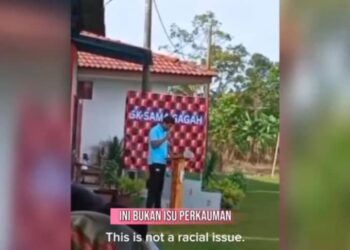 TANGKAP layar video tular seorang lelaki didakwa warga asing sedang memberi ucapan perasmian dalam program sukan di sebuah sekolah di Semanggol.  - UTUSAN