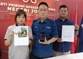 GOH JIA HUI menunjukkan tangkap layar hantaran dalam Facebook yang mendakwa dia mempunyai pertalian keluarga dengan seorabg lelaki yang meminjam wang daripada along.