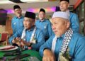 TAKIYUDDIN Hassan (duduk, kiri) bersama Tuan Ibrahim Tuan Man (duduk, kanan) pada sidang akhbar selepas Majlis Perasmian Mesyuarat Agung Tahunan Pas Kawasan Kota Bharu Kali Ke-58 di Kota Bharu, Kelantan. - UTUSAN/MUSTAQIM MOHAMED