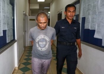 MOHD. Nizam Shah Shahruddin di Mahkamah Tinggi Taiping hari ini. - UTUSAN/MUHAMAD NAZREEN SYAH MUSTHAFA