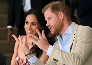 MEGHAN Markle dan suaminya, Putera Harry. - AFP