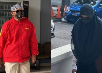 MHD Lihan Sabari (kiri) dan isterinya Noor Nisrin hadir ke Mahkamah Sesyen Seremban hari ini bagi didakwa pertuduhan menawarkan pakej haji dengan menerima transaksi bayaran RM81,000 daripada seorang wanita tanpa lesen pengelola jemaah haji yang sah pada Februari hingga April lalu. - UTUSAN/NOR SHAFAWATI YUP
