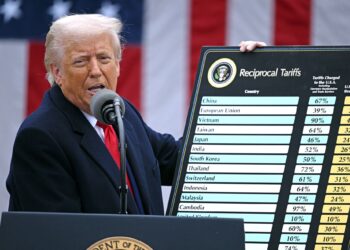 DONALD Trump menunjukkan carta mengenai tarif timbal balik dalam acara 'Make America Wealthy Again' di Rose Garden, Rumah Putih, di Washington, DC, pada 2 April lalu.- AFP