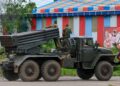 ASKAR Kemboja menaiki trak yang dilengkapi pelancar roket BM-21 di wilayah utara Oddar Meanchey, berhampiran sempadan Thailand, pada Ahad lalu. – AFP