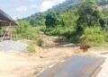 KERJA-KERJA pembinaan jambatan Pos Balar, Gua Musang, Kelantan dimulakan sejak 7 Julai lalu susulan laporan Utusan Malaysia mengenai kepayahan anak Orang Asli menuntut ilmu. – IHSAN OSMAN ANJANG