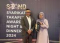 Naib Pengerusi Koperasi TNB, Azlan Ahmad bersama Ketua Bahagian Takaful, Norlaily Zainuddin menerima Premier Platinum Award daripada Takaful Malaysia, baru-baru ini.