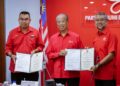 JASRI Jamaluddin (kanan) menyatakan sokongan tidak berbelah bahagi Bersatu Bahagian Maran kepada Muhyiddin Yassin (tengah) selaku Presiden parti tersebut.