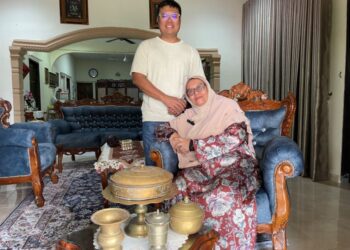 PENULIS dibawa Hafiz Hisan bertemu emak saudaranya di Bota Kiri, Perak untuk mendengar kisah lama.