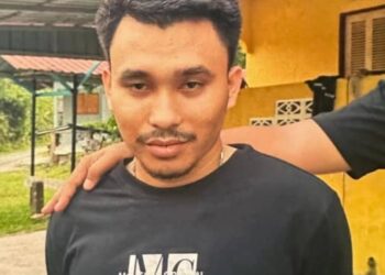 ZULHAKIMY Aiman Suhairuddin yang menjadi buruan polis selama dua tahun akhirnya dicekup di Kampung Bukit Lata, Pasir Mas, Kelantan semalam.-IHSAN POLIS