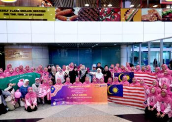 KUMPULAN Orkestra Sekolah Seri Puteri, SPWinds yang menerima Anugerah Emas dalam Festival Orkestra Dunia ke-11, di KLIA, malam tadi.