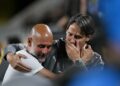 BOS Manchester City, Pep Guardiola (kiri) bersalaman dengan ketua jurulatih Al Hilal, Simone Inzaghi ketika perlawanan bola sepak pusingan 16 Piala Kelab Dunia FIFA 2025 di Stadium Camping World, Orlando hari ini. - AFP