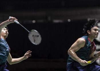 Goh Sze Fei-Nur Izzuddin tewas kepada Kim Won-ho-Seo Seung-jae pada final Terbuka Jepun di Gimnasium Tokyo, kelmarin. - AFP