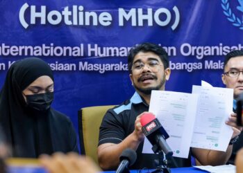 HISHAMUDDIN Hashim (tengah) ketika sidang media berkaitan kes anak dijual ke Kemboja, sindiket pemerdagangan manusia di Pejabat MHO di Kuala Lumpur hari ini. - UTUSAN/M. FIRDAUS M. JOHARI