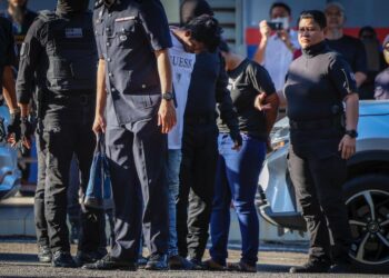 epasang kekasih didakwa di Mahkamah Majistret Sepang atas pertuduhan membunuh dan bersubahat membunuh seorang penuntut universiti swasta di Cyberjaya. - UTUSAN/IQBAL ROSLI