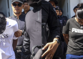 TERTUDUH, M. Sri Darvien (kiri) dan V. D. Thineswary dibawa keluar selepas didakwa atas kesalahan membunuh seorang penuntut universiti, Maniisharpriet Kaur Akhara bulan lalu di Mahkamah Majistret Sepang, semalam. – UTUSAN/MUHAMAD IQBAL ROSLI