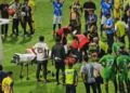 PASUKAN perubatan memberikan rawatan kepada Firos Mohamed selepas pemain itu rebah ketika menyertai kejohanan bola sepak di Stadium Majlis Perbandaran Manjung semalam. - UTUSAN