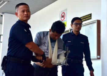 MOHD. Safri Jilji dihadapkan ke Mahkamah Majistret, Alor Gajah, Melaka atas pertuduhan mencuri 11 kotak susu bernilai RM1,826.10. - UTUSAN/ARIF HAMIZAN MISKON