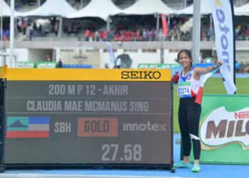 CLAUDIA Mae Mcmanus Sing dari Sabah merangkul emas acara 200 meter perempuan bawah 12 tahun dalam Kejohanan Olahraga Majlis Sukan Sekolah Malaysia (MSSM) Kali Ke-65 di Stadium Tuanku Syed Putra, Kangar, Perlis hari ini.-UTUSAN/IZLIZAN OTHMAN
