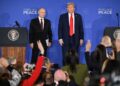 PRESIDEN AS, Donald Trump dan Presiden Russia, Vladimir Putin berdiri di hadapan wartawan semasa sidang media bersama selepas sidang kemuncak AS-Russia mengenai Ukraine di Anchorage, Alaska, kelmarin.- AFP