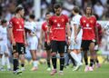 Pemain tengah Manchester United, Manuel Ugarte (kiri), Bersama Bruno Fernandes (tengah) dan pertahanan Leny Yoro bertindak balas selepas perlawanan bola sepak Liga Perdana Inggeris (EPL) menentang Fulham di Craven Cottage, London hari ini. - AFP