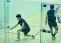 Joachim Chuah (kiri) sewaktu beraksi menentang Yehia Essam pada pusingan pertama Kejohanan Skuasy Piala Tuanku Mukhriz 2025 di Kompleks Sukan Tan Sri Dato' Hj Mohd Said, Seremban, hari ini.-UTUSAN/ MOHD SHAHJEHAN MAAMIN.