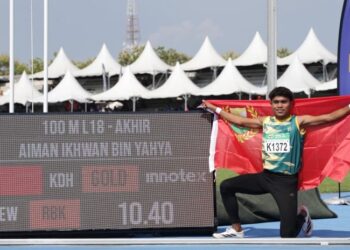 AIMAN Ikhwan Yahya mencatat rekod 10.40 saat pada aksi akhir 100 meter lelaki bawah 18 tahun di Stadium Tuanku Syed Putra, Kangar, Perlis, semalam. - UTUSAN