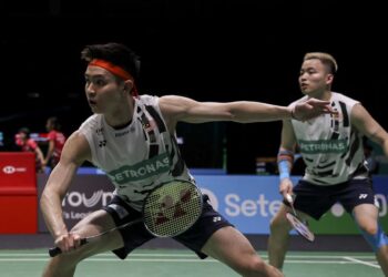 Aaron Chia-Soh Wooi Yik bersedia memikul cabaran di Sukan SEA Thailand 2025 pada Disember ini walaupun jadual temasya itu bertindih dengan Jelajah Dunia Akhir Persekutuan Badminton Dunia (BWF). - UTUSAN/SHIDDIEQIIN ZON