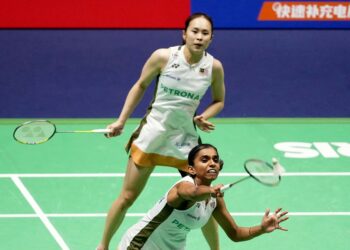 Pearly Tan-M. Thinaah menewaskan rakan senegara, Go Pei Kee-Teoh Mei Xing 21-12, 21-15 pada aksi suku akhir Terbuka Hong Kong di Hong Kong Coliseum hari ini.