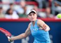 Elena Rybakina dari  bermain pukulan depan menentang Marta Kostyuk semasa perlawanan suku akhir perseorangan wanita pada Terbuka Kanada di Stadium IGA di Montreal, hari ini. - AFP