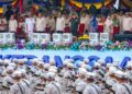 YANG di-Pertuan Agong, Sultan Ibrahim dan Raja Permaisuri Agong, Raja Zarith Sofiah diiringi Perdana Menteri Anwar Ibrahim dan 
Menteri-menteri Kabinet menyaksikan perbarisan Hari Kebangsaan di Dataran Putrajaya, semalam. – UTUSAN/FARIZ RUSADIO