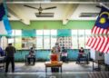 Rakyat Sabah turun mengundi pada PRN ke-16, 2020 di Sekolah Kebangsaan Serusup, Tuaran. – MINGGUAN/ SHIDDIEQIIN ZON