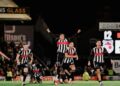 Pemain-pemain Grimsby Town meraikan kejayaan mereka meneruskan saingan Piala Liga selepas menewaskan Manchester United 12-11 menerusi penentuan sepakan penalti, semalam. - GRIMSBY TOWN FC
