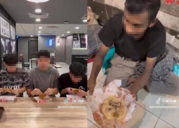 TANGKAP layar video memaparkan tiga lelaki dipercayai memberikan bungkusan nasi bersama tulang ayam kepada seorang gelandangan.