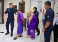 DUA suspek direman bermula hari ini kerana disyaki melakukan penderaan fizikal terhadap kanak-kanak di Mahkamah Majistret Kuala Terengganu. - UTUSAN/PUQTRA HAIRRY