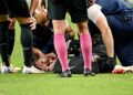 Pemain Tottenham Hotspur James Maddison bertindak balas sebelum diusung keluar padang, selepas mengalami kecederaan semasa perlawanan bola sepak persahabatan antara Tottenham Hotspur dan Newcastle United di Seoul, Korea Selatan pada 3 Ogos lalu. - AFP