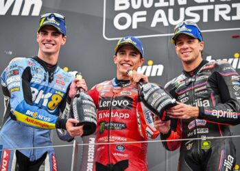 (DARI kiri) Fermin Aldeguer, Marc Marquez, dan Marco Bezzecchi meraikan di podium selepas Grand Prix MotoGP Austria di Litar Red Bull Ring, semalam. - AFP