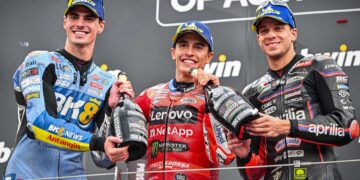 (DARI kiri) Fermin Aldeguer, Marc Marquez, dan Marco Bezzecchi meraikan di podium selepas Grand Prix MotoGP Austria di Litar Red Bull Ring, semalam. - AFP