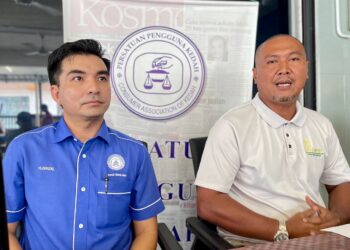 ABDUL Rashid Yob (kanan) dan Yusrizal pada sidang akhbar berkaitan beras putih tempatan di Alor Setar, Kedah hari ini.