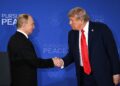 DONALD Trump berjabat tangan dengan Vladimir Putin dalam pertemuan di Anchorage, Alaska pada bulan lalu. - AFP