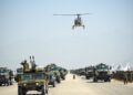 KENDERAAN tentera Taliban menyertai perarakan sempena ulang tahun ketiga pentadbiran kerajaan Afghanistan di Pangkalan Udara Bagram. - AFP