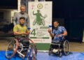PEMAIN tenis berkerusi roda negara, Abu Samah (kiri) bersama gandingannya, Mohamad Yusshazwan Yusoff bergambar bersama trofi kemenangan selepas menjuarai kategori beregu lelaki di Jelajah Tenis Kerusi Roda Montecchio Maggiore, Itali, baru-baru ini.