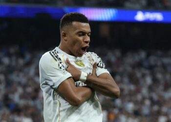AKSI penyerang Real Madrid, Kylian Mbappe selepas menjaringkan gol menentang Olympique Marseille dalam aksi Liga Juara-Juara Eropah di Santiago Bernabeu, Sepanyol, semalam. - AFP