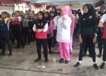 MURID Sekolah Kebangsaan Bukit Selambau sedang menjalani latihan senaman pada program yang diadakan baru-baru ini.