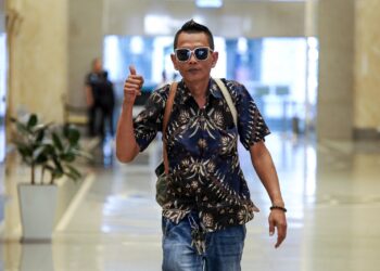 Penganggur, Sharil Mohd Sarif hadir bagi mendengar rayuan kerana menghina Yang di-Pertuan Agong di Mahkamah Rayuan Putrajaya, di sini, hari ini. -UTUSAN/FAISOL MUSTAFA