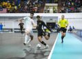 SYAHIR Iqbal Khan cuba melepasi kawalan pemain mengasak hebat Pemain Iran ketika aksi Kelayakan Piala Asia Futsal 2026  di Stadium Tertutup SUKPA Kuantan di sini hari ini.GAMBAR MUHAMMAD NAIM HELMI HAFIDZI